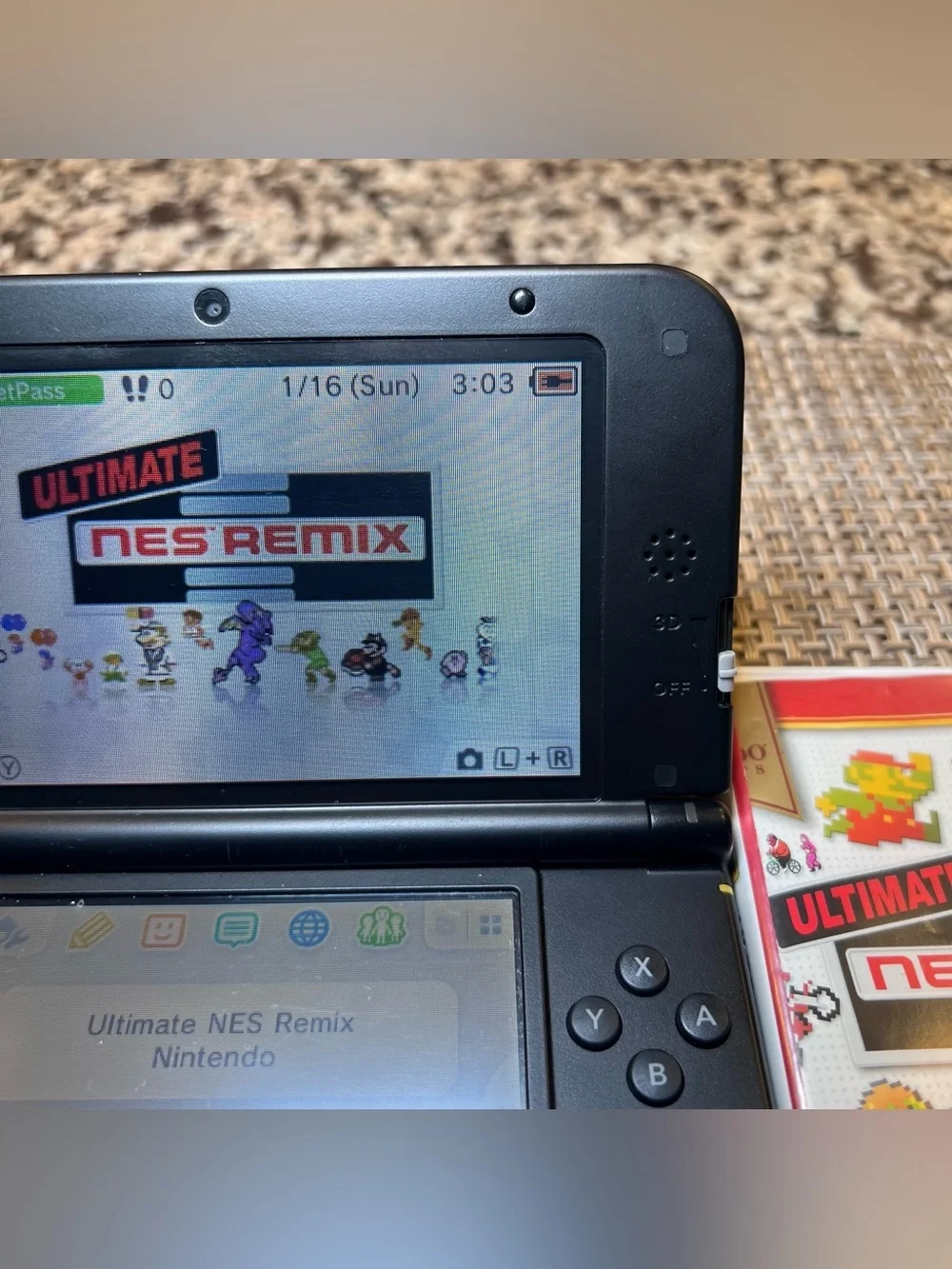 Nintendo 3DS XL Handheld Console in Black with Ultimate NES Remix